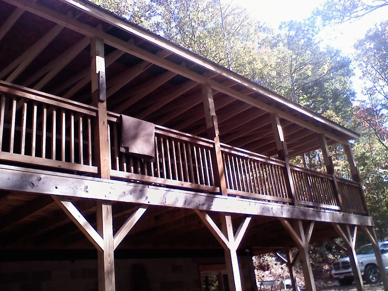 Timber framing under a new elevated porch and deck — Roof Leak Repair in Blowing Rock by Roofing Brothers